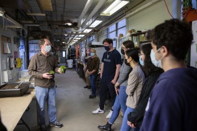 Matt Opel, Collections Scientist in the UConn Botanical Conservatory, speaks to UConn students during a houseplant workshop on March 31, 2022. (Bri Diaz/UConn Photo)