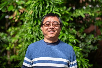 Yaowu Yuan, a professor of ecology and evolutionary biology, in the UConn Botanical Conservatory on March 25, 2024. (Bri Diaz/UConn Photo)
